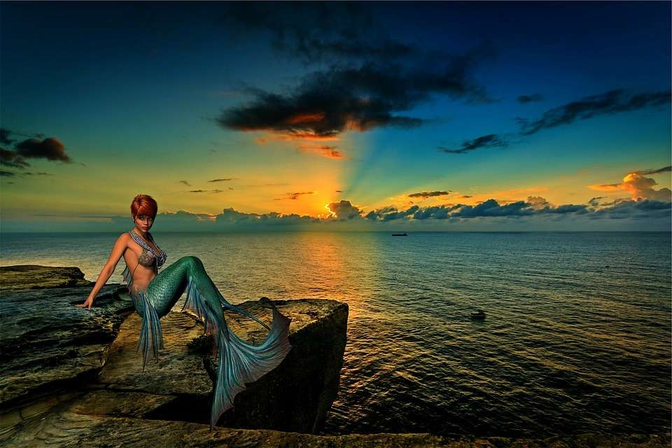 Meerjungfrau im Sonnenuntergang ............... Online-Puzzle