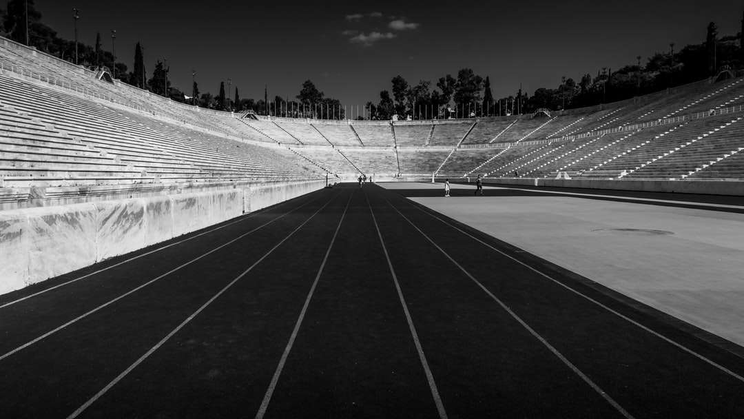 grayscale of stadium at night jigsaw puzzle online