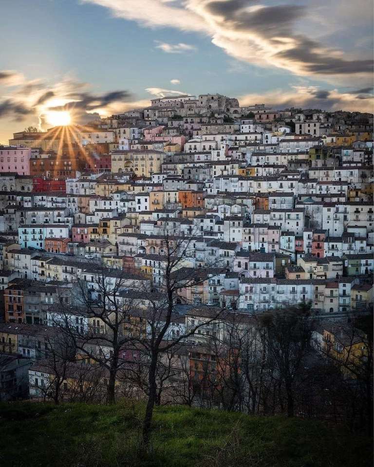início do pôr do sol Calitri Itália quebra-cabeças online