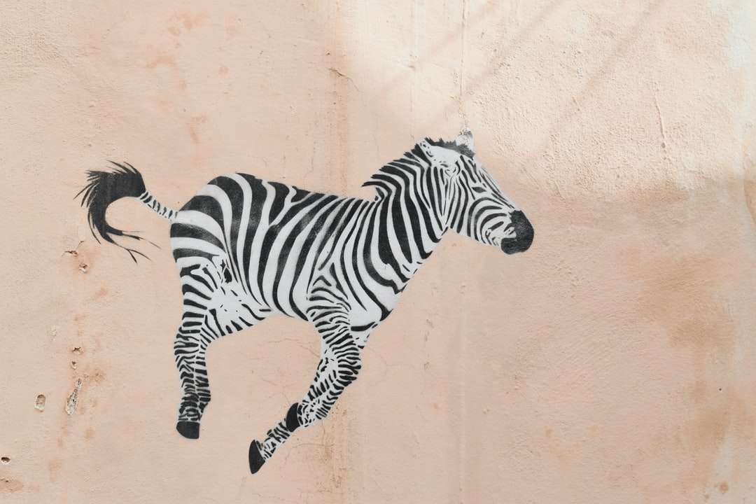 зебра животинска глава върху кафяв пясък онлайн пъзел