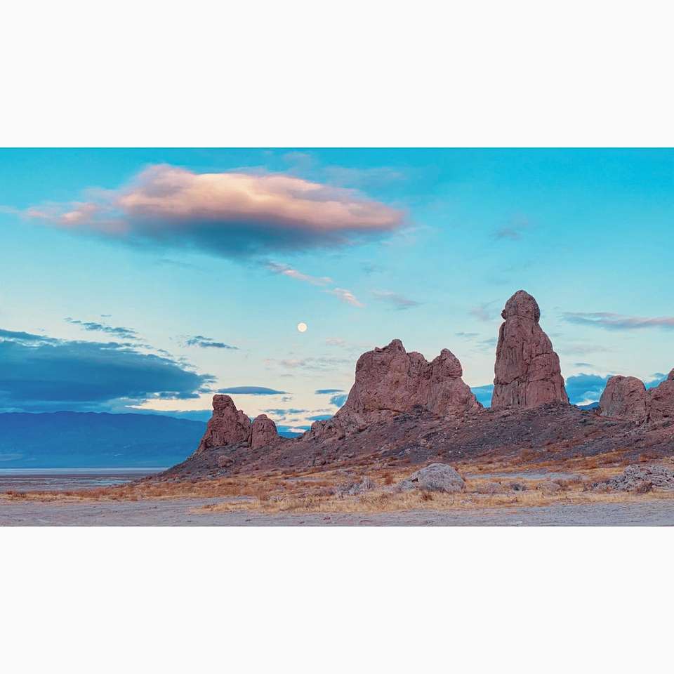 brown rock formation under blue sky jigsaw puzzle online