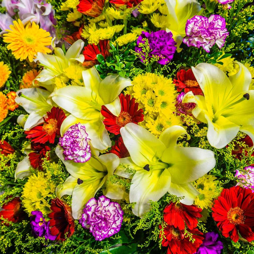 yellow and pink flowers with green leaves jigsaw puzzle online