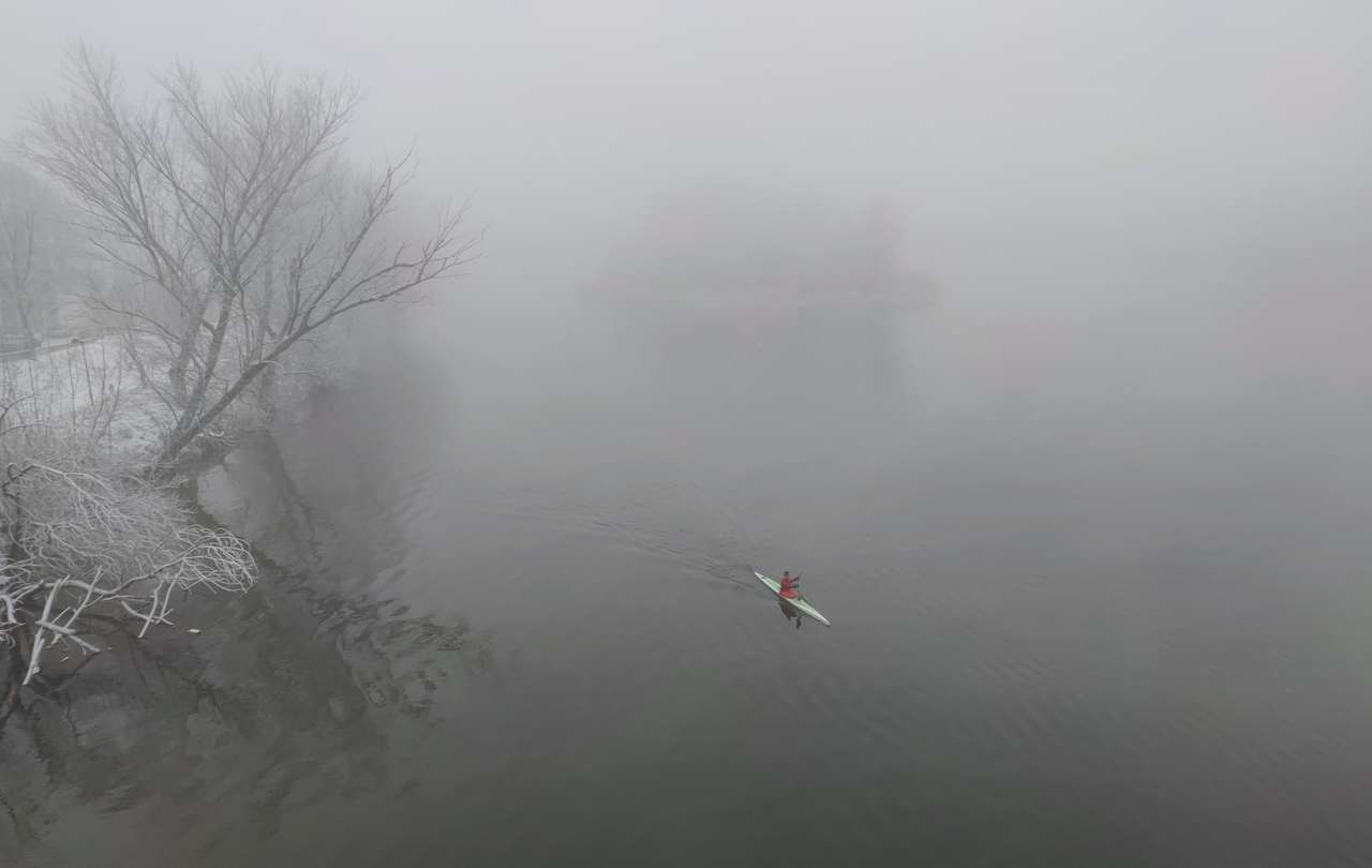 Canoe in the fog of Zamora-Spain. jigsaw puzzle online