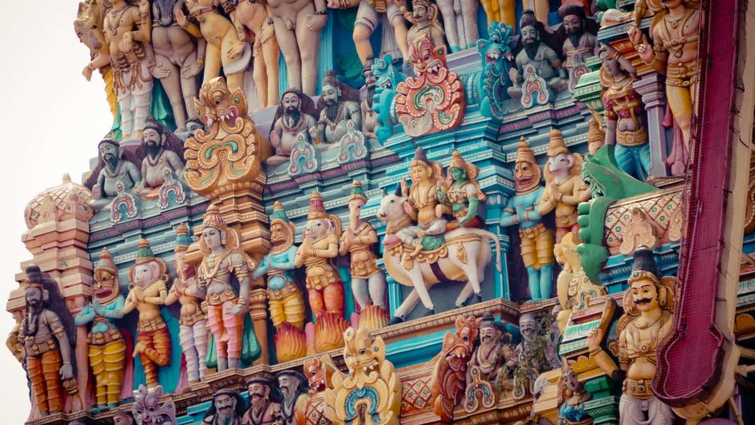 златни и сини статуи на индуистки божества онлайн пъзел