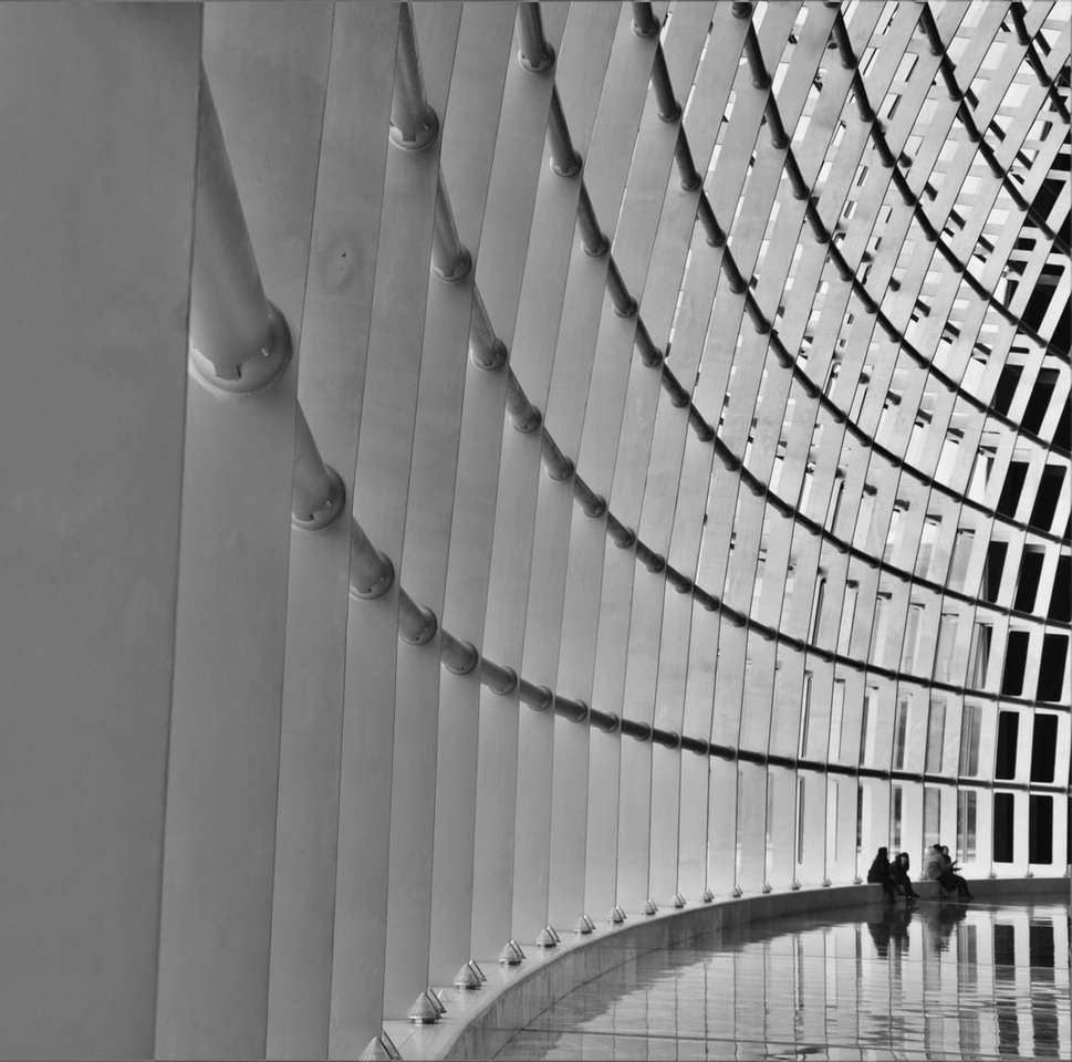 grayscale photo of people walking on spiral stairs jigsaw puzzle online
