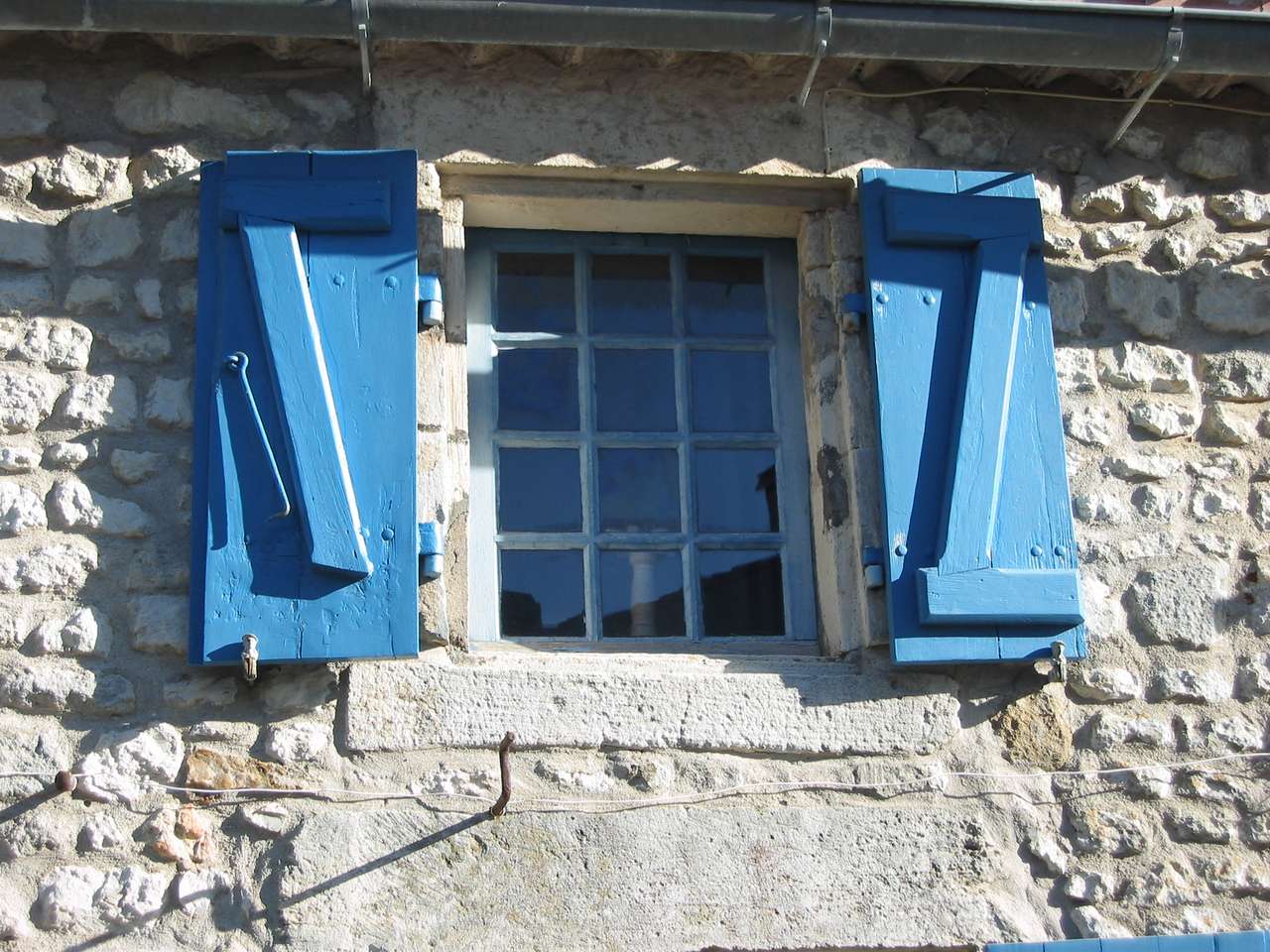 Det blå fönstret Pussel online