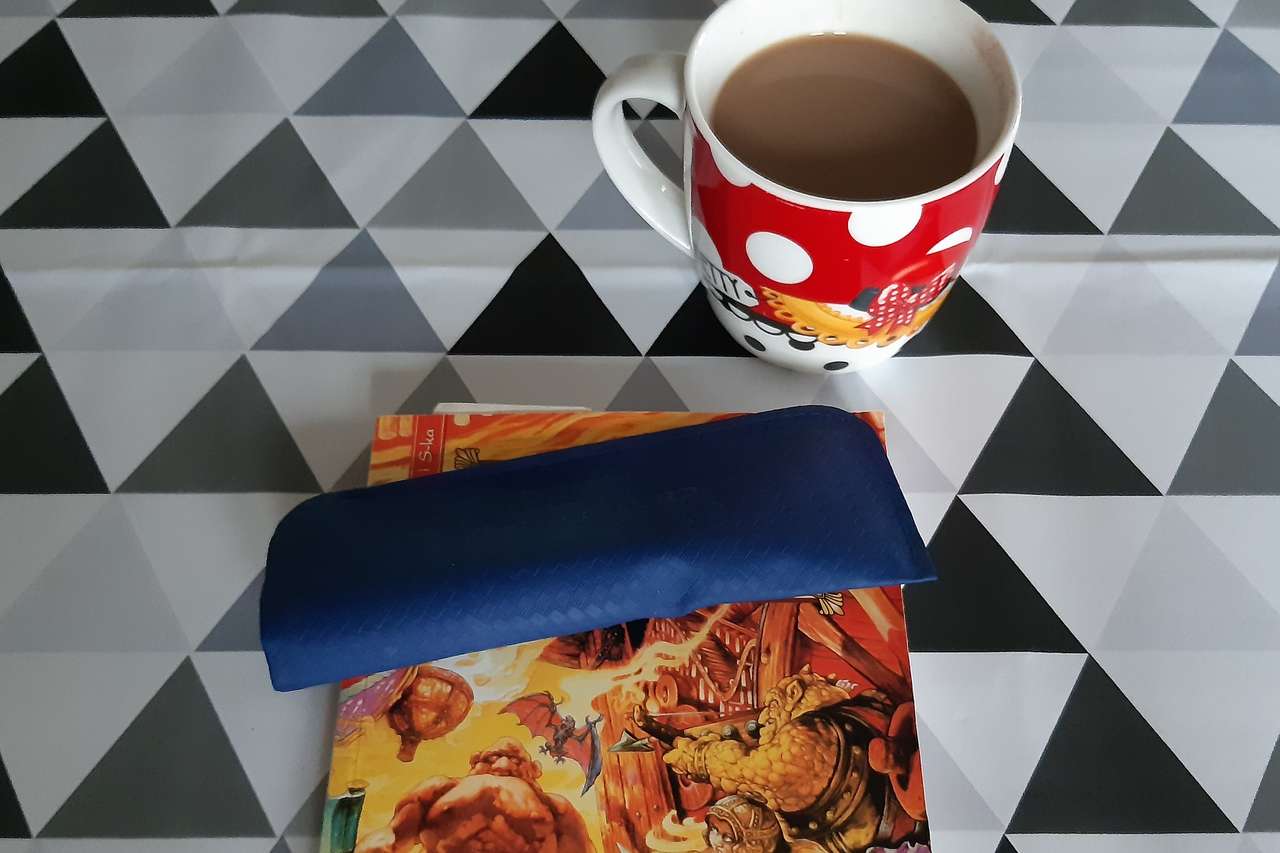 book and coffee on oilcloth jigsaw puzzle online