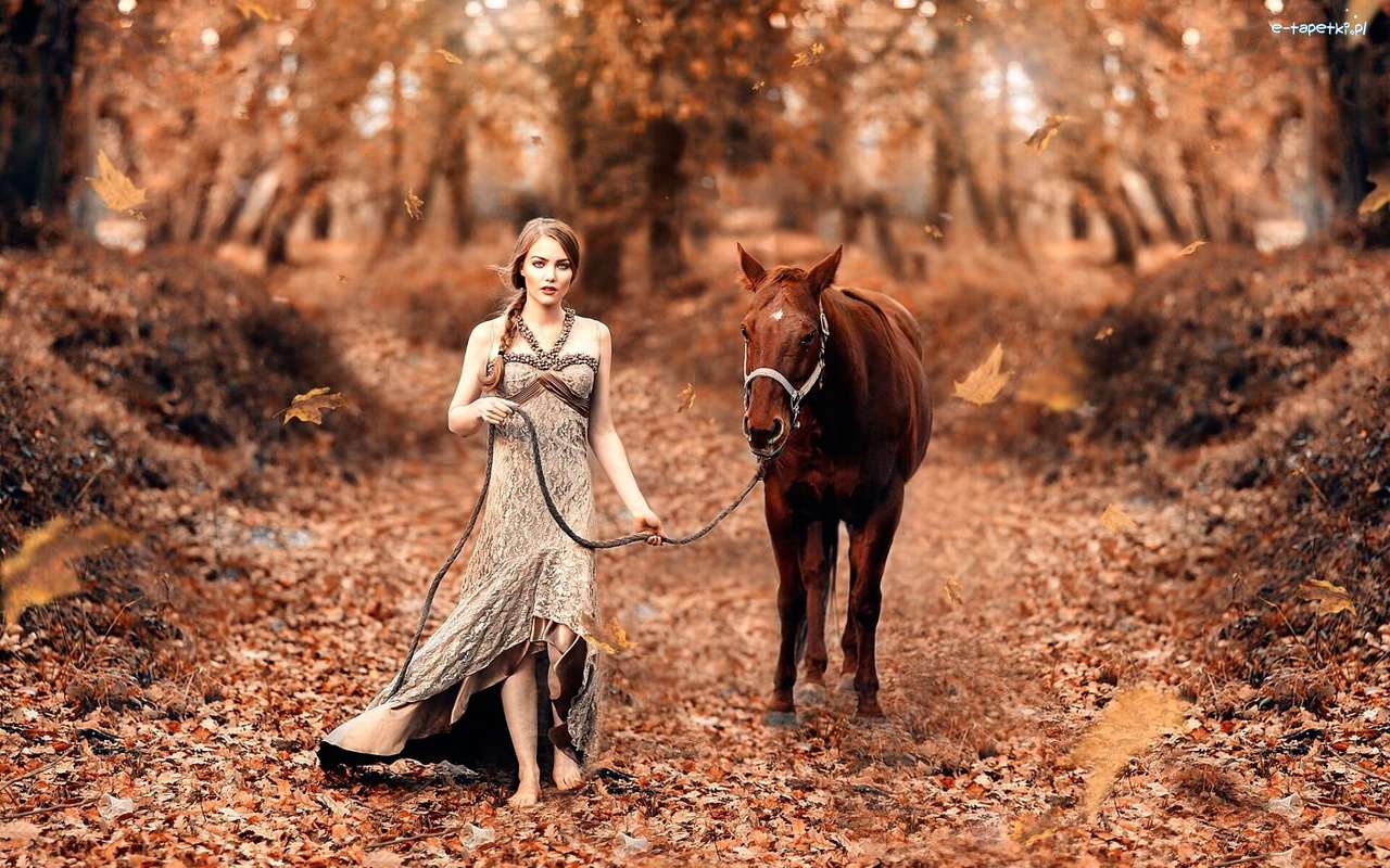 donna nel bosco con il suo cavallo puzzle online