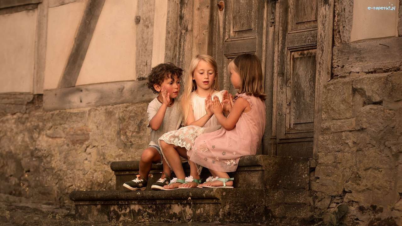 children sitting on the steps of the house jigsaw puzzle online