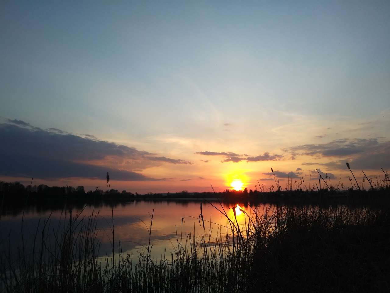 Ηλιοβασίλεμα στο Kryspinów online παζλ