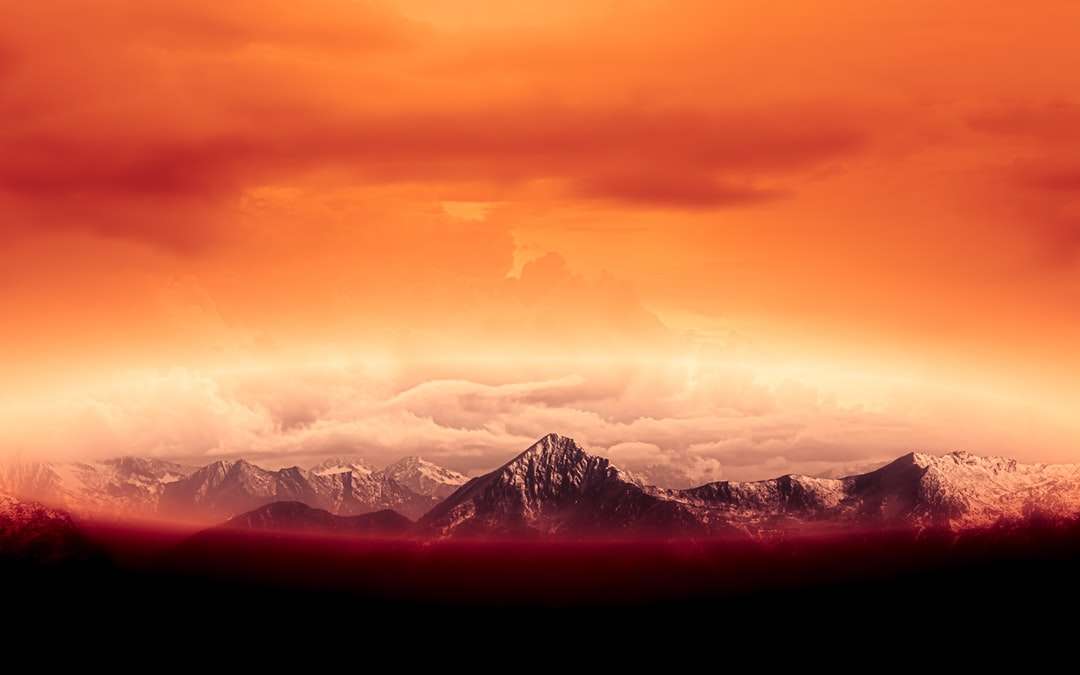 zasněžené hory při západu slunce online puzzle