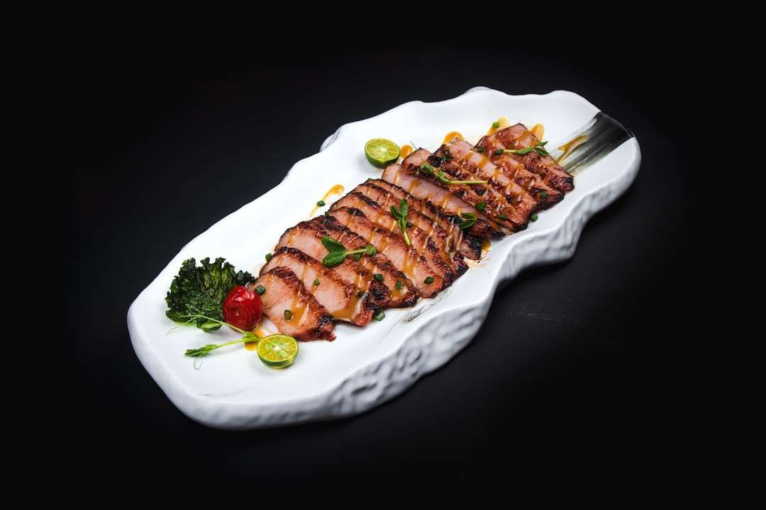 grilled meat on white ceramic plate online puzzle