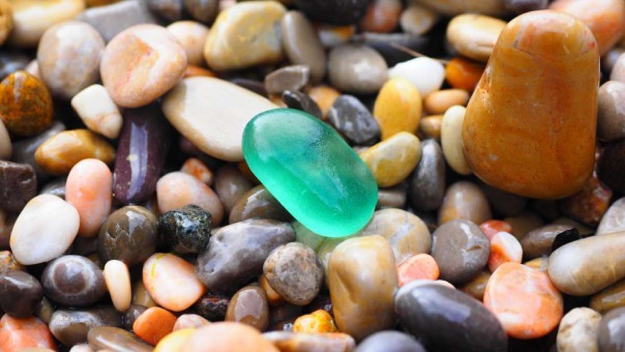Pebbles färgglada runda Pussel online