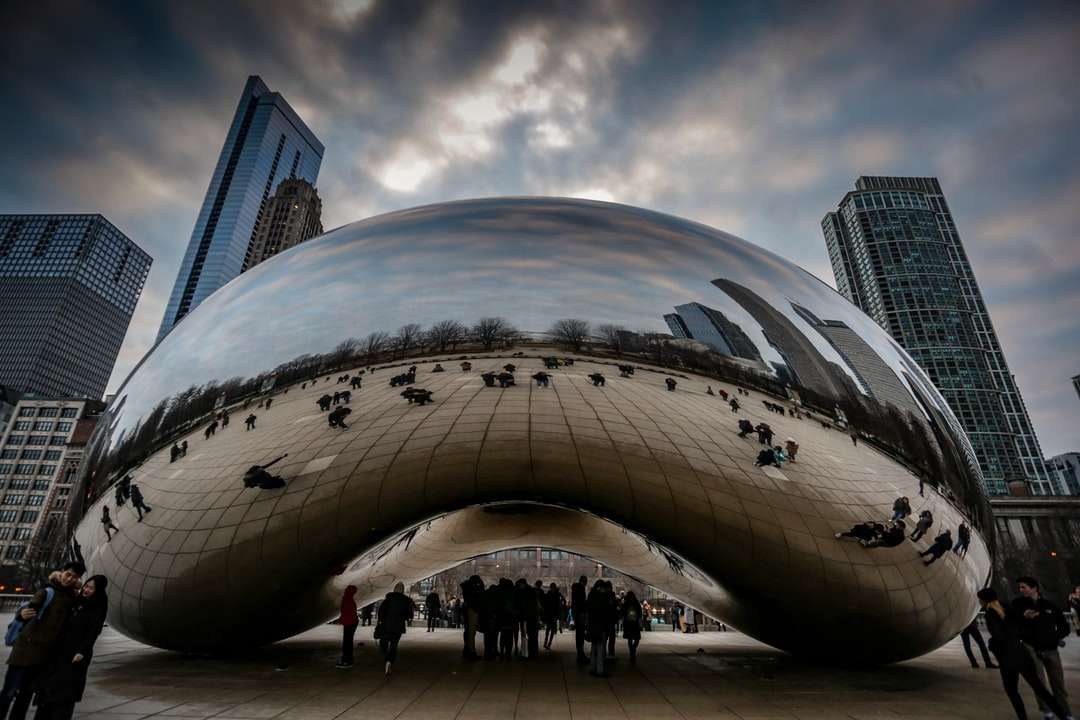 people walking near cloud gate during daytime online puzzle