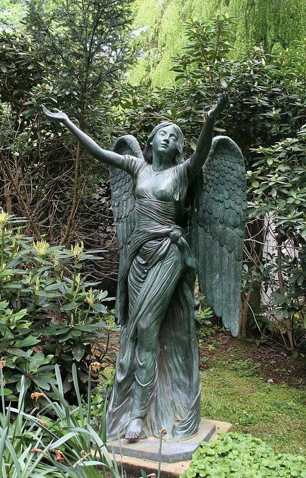 Άγαλμα αγγέλου σε ένα νεκροταφείο παζλ online