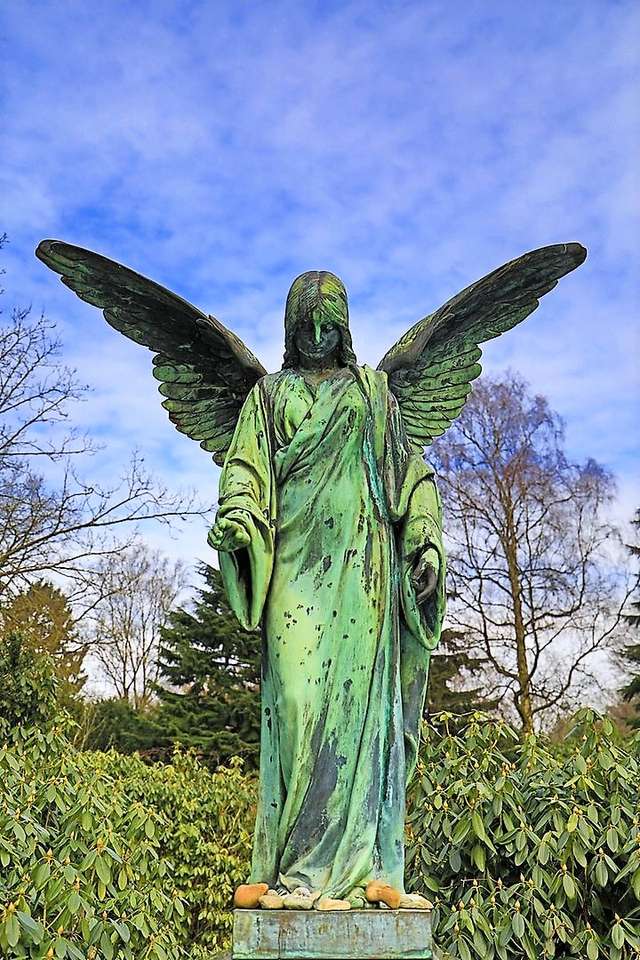Статуя ангела на кладбище пазл онлайн