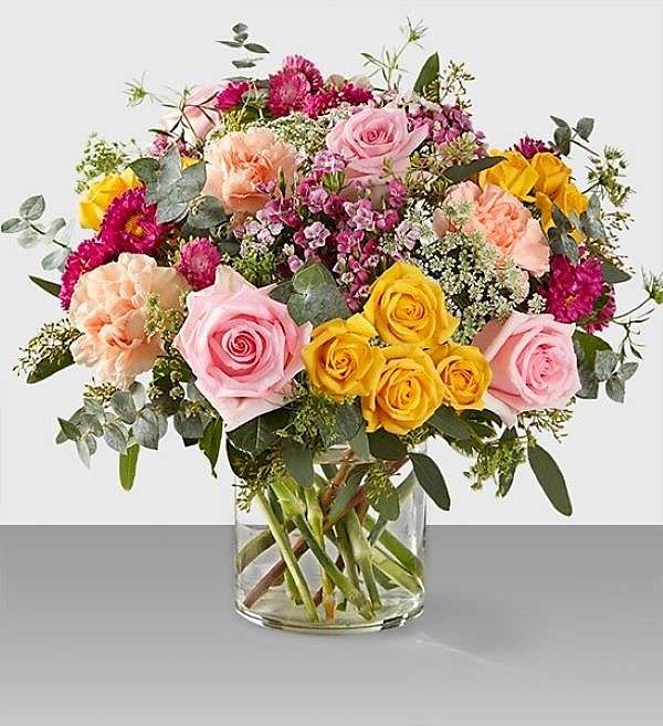 Bouquet coloré dans le vase en verre puzzle en ligne