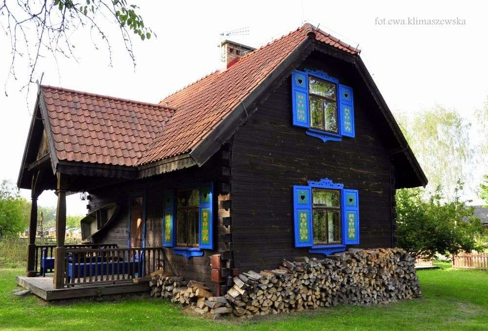 Een huis met blauwe luiken online puzzel