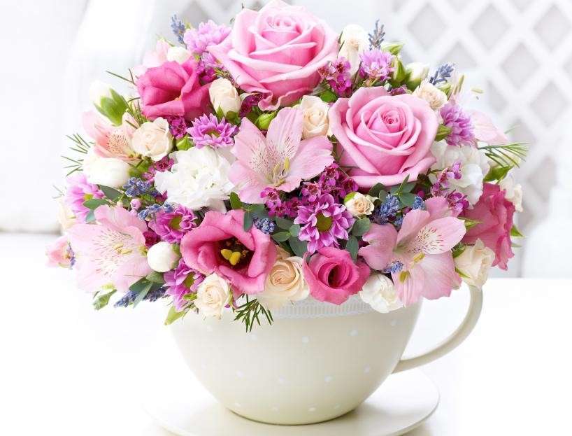 Un bouquet rose dans une tasse puzzle en ligne