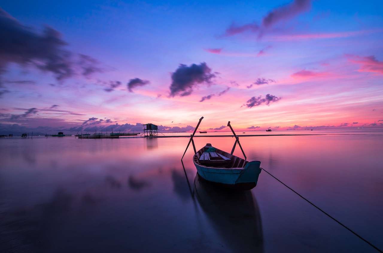 Een boot, blauwe en roze lucht :) legpuzzel online