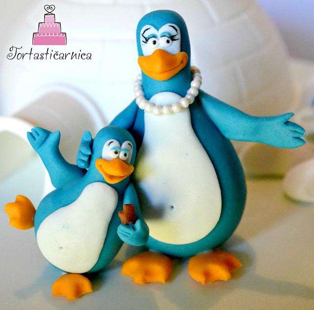 Pingüinos de hielo con un anuncio de Baton rompecabezas en línea