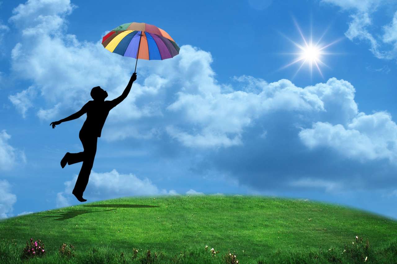 Vlucht met een regenboogparaplu online puzzel