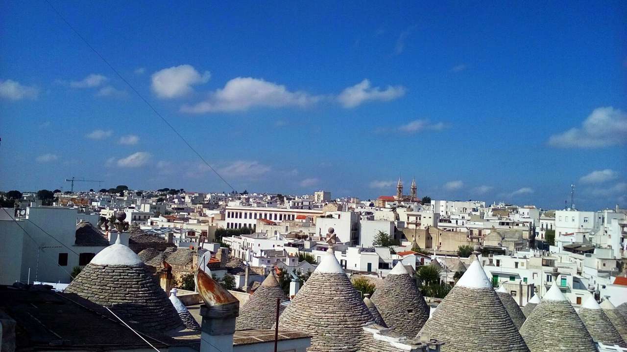 Sobre os telhados de Alberobello quebra-cabeças online