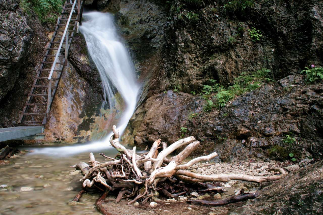 Waterfall in the mountains jigsaw puzzle online