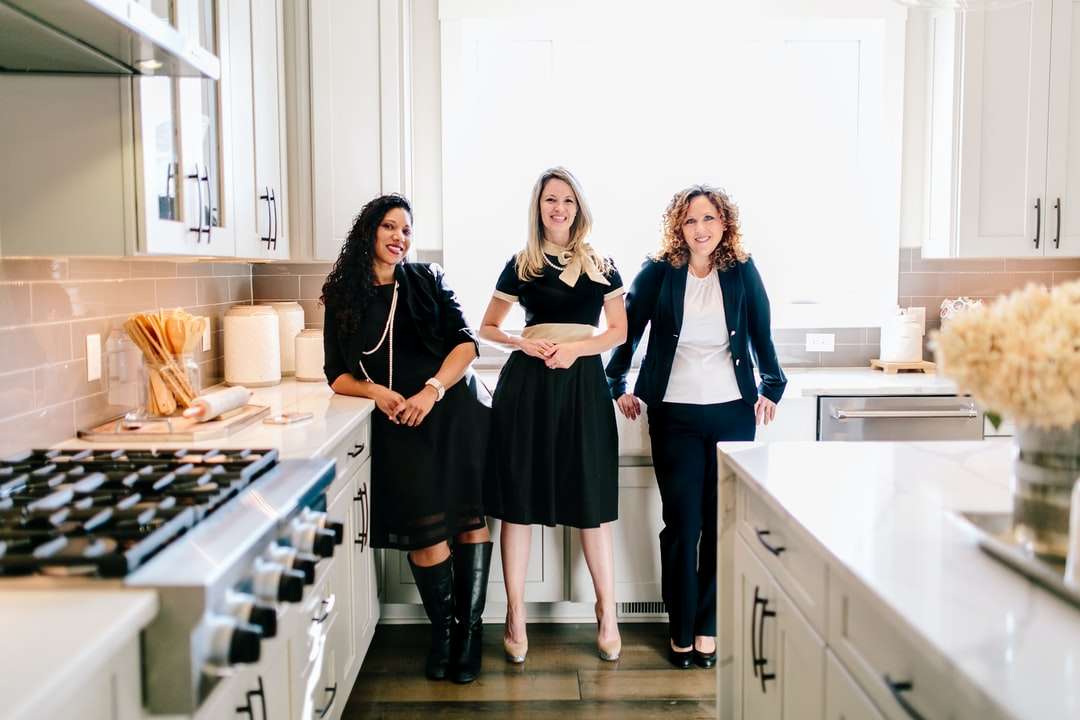 3 women standing on kitchen online puzzle