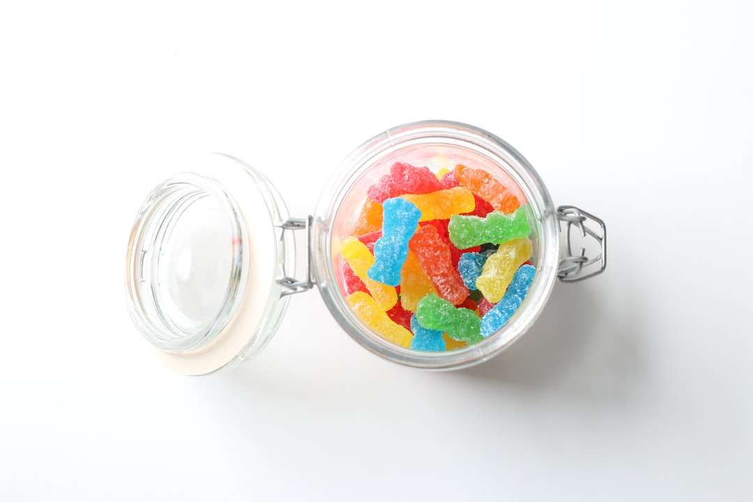clear glass jar with red and yellow food online puzzle