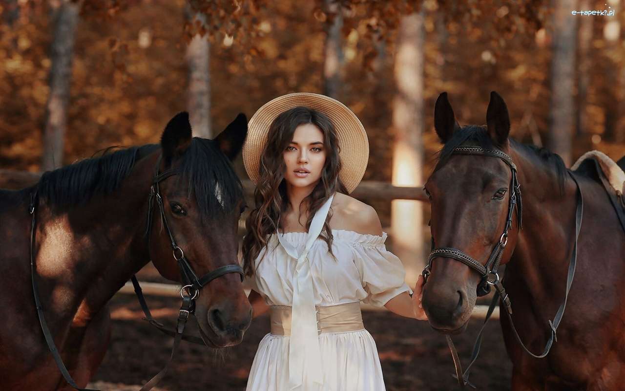 Lány két lóval kirakós online