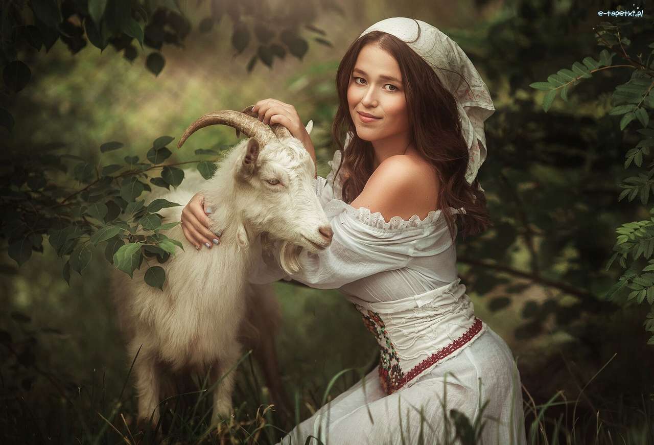 Дівчина з козами онлайн пазл