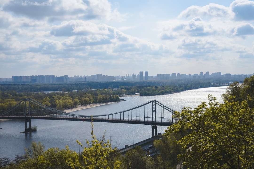 bridge over river during daytime online puzzle