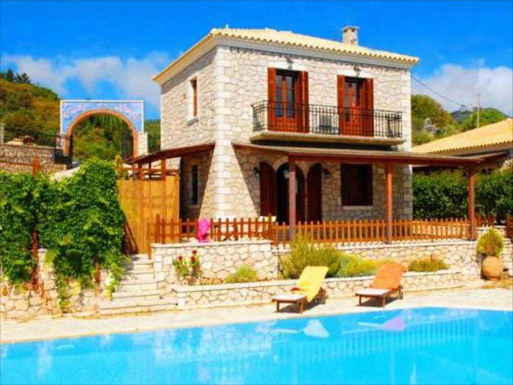 Une maison avec une piscine en Grèce puzzle en ligne