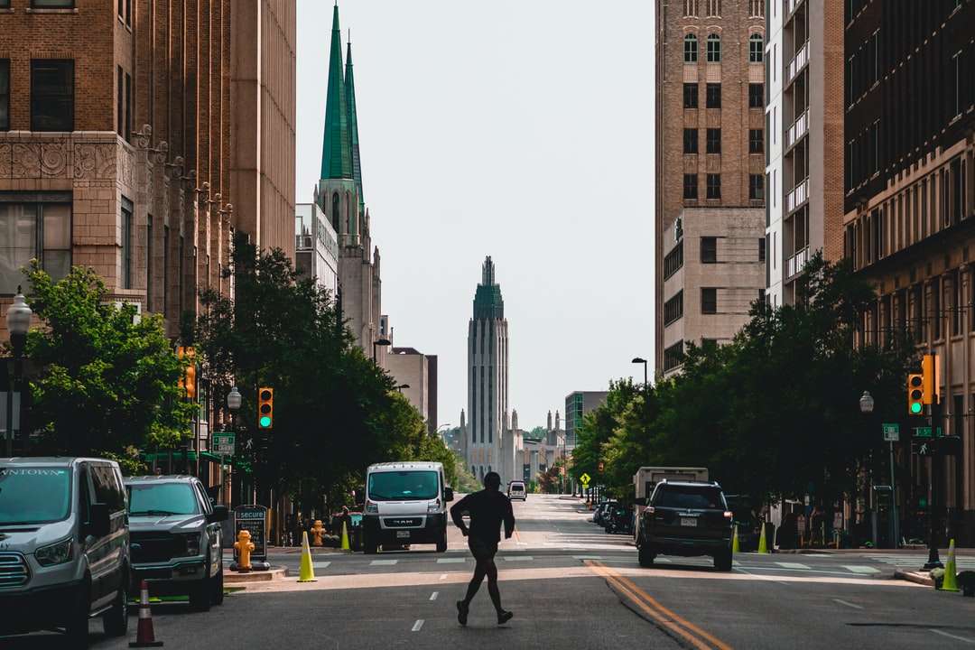 people walking on pedestrian lane near high rise buildings online puzzle