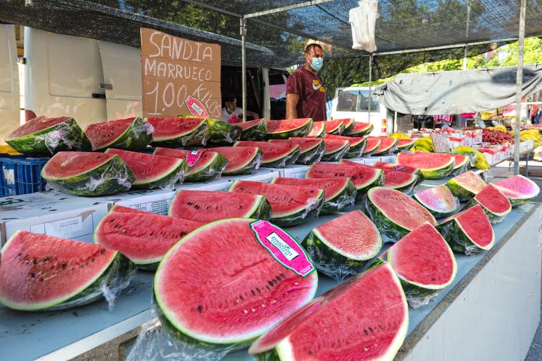 sliced watermelon on display during daytime online puzzle