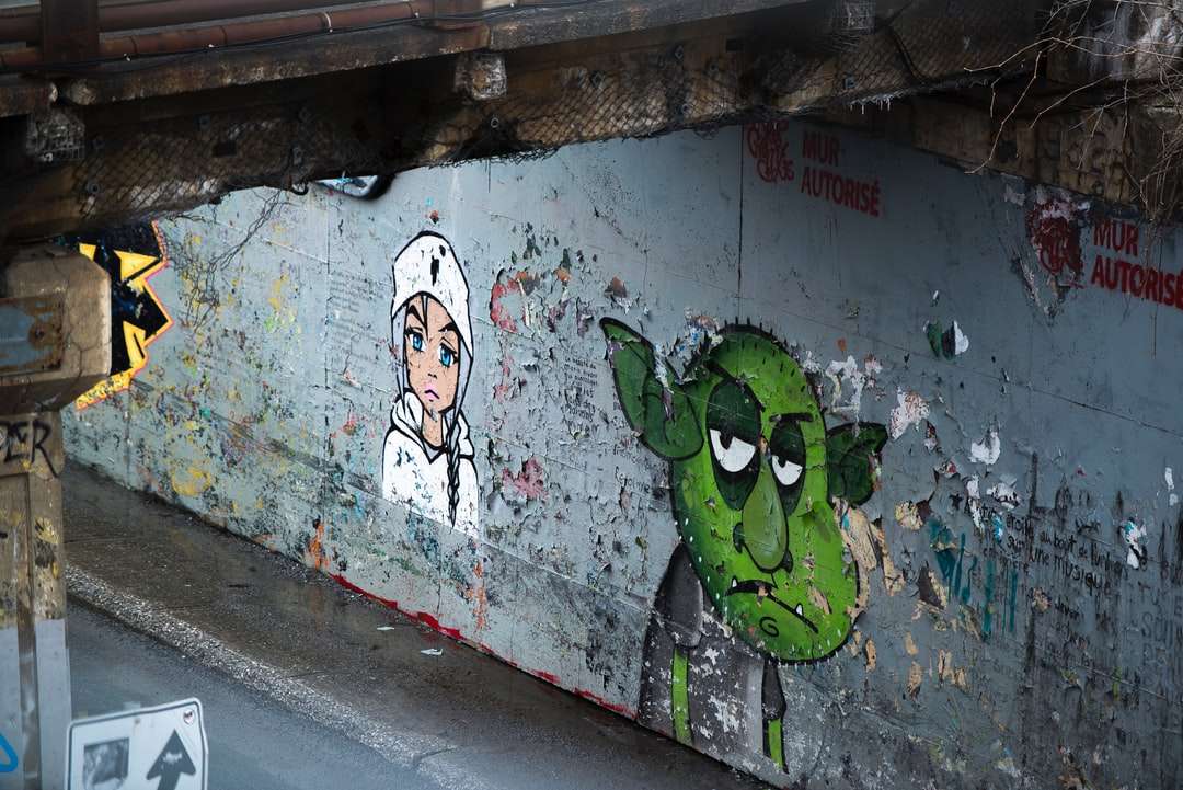 Graffiti de rana verde en la pared rompecabezas en línea