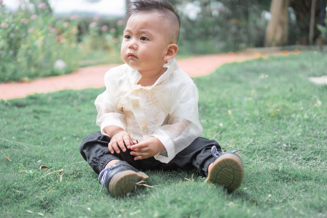 baby in white dress shirt and black pants jigsaw puzzle online