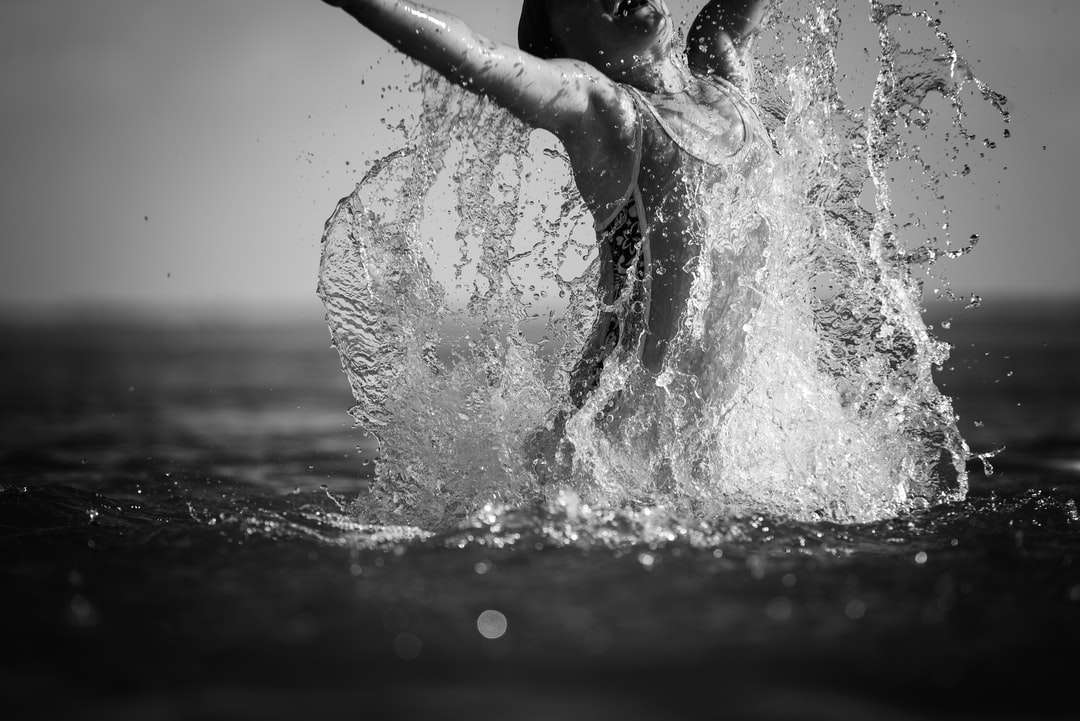 grayscale photo of woman in water jigsaw puzzle online