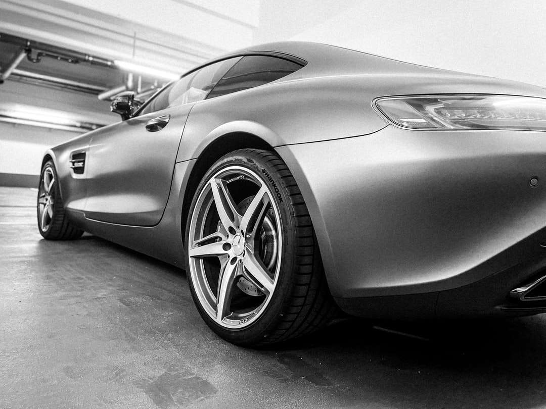 grayscale photo of mercedes benz coupe online puzzle