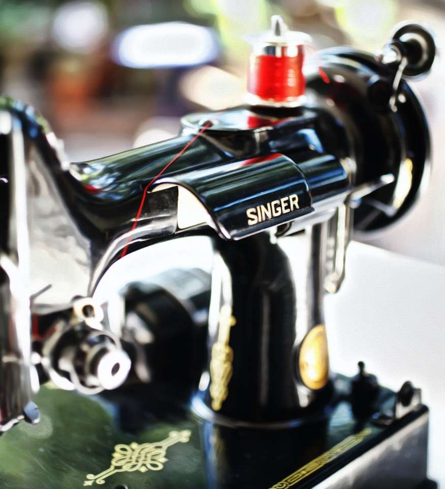 Фокусная фотография швейной машины Зингер пазл онлайн