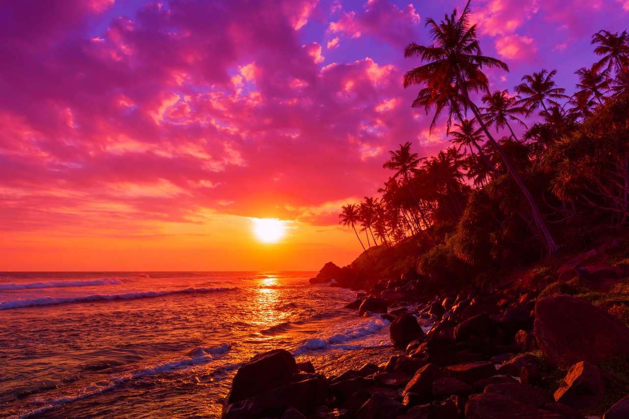 Solnedgång på tropisk strand pussel på nätet