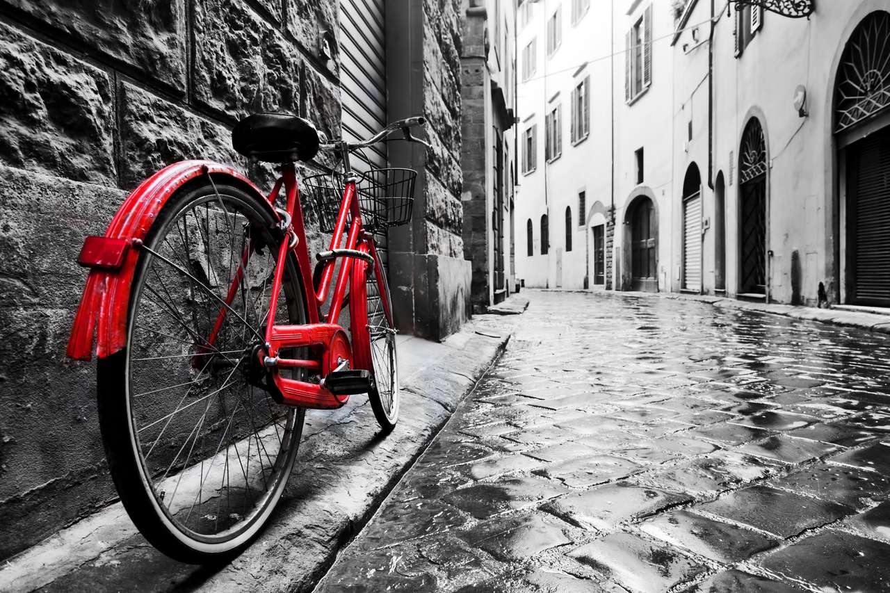 Vintage röd cykel pussel på nätet