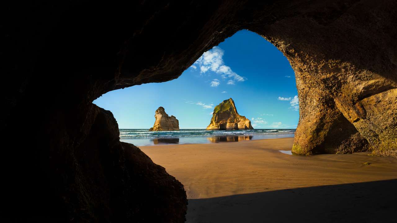 Cave on the beach jigsaw puzzle online