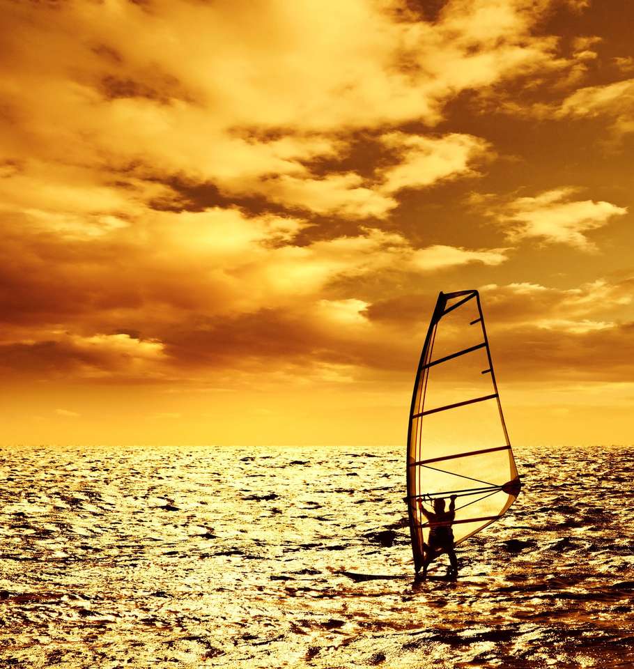 Windsurfer πάνω από το ηλιοβασίλεμα παζλ online