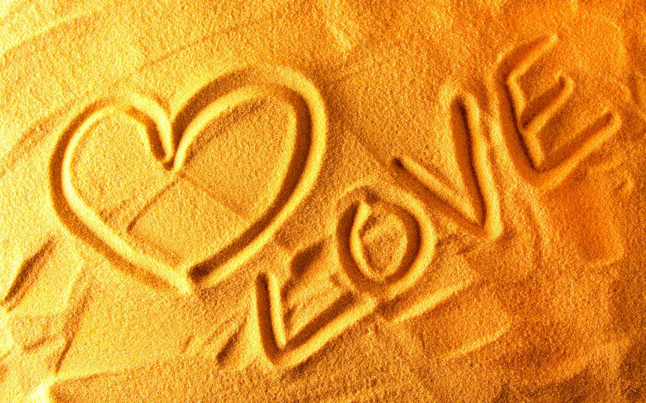 Amor en la arena rompecabezas en línea