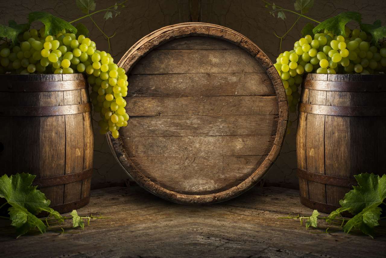 Wine cellar with barrels and grapes jigsaw puzzle online