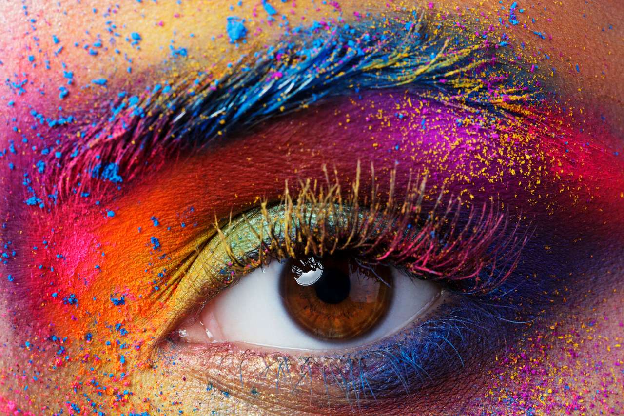 Female eye with bright multicolored fashion makeup online puzzle