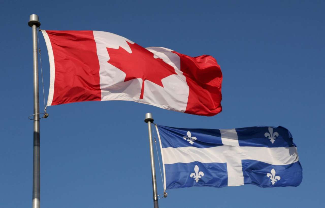 Flagga av Kanada och Quebec Pussel online