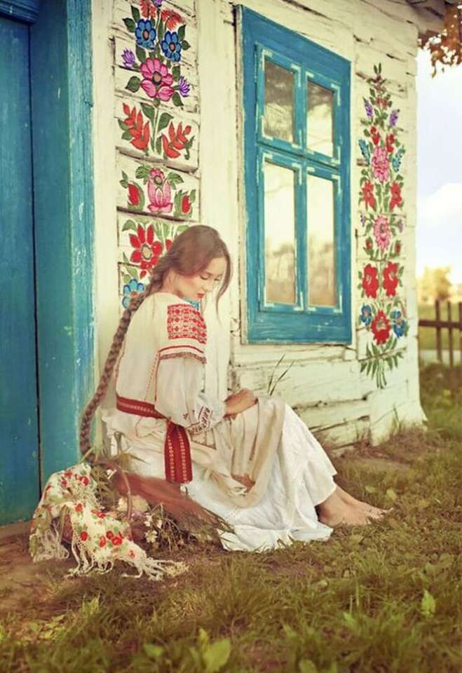 Ung kvinna sitter på dörren (målning) Pussel online